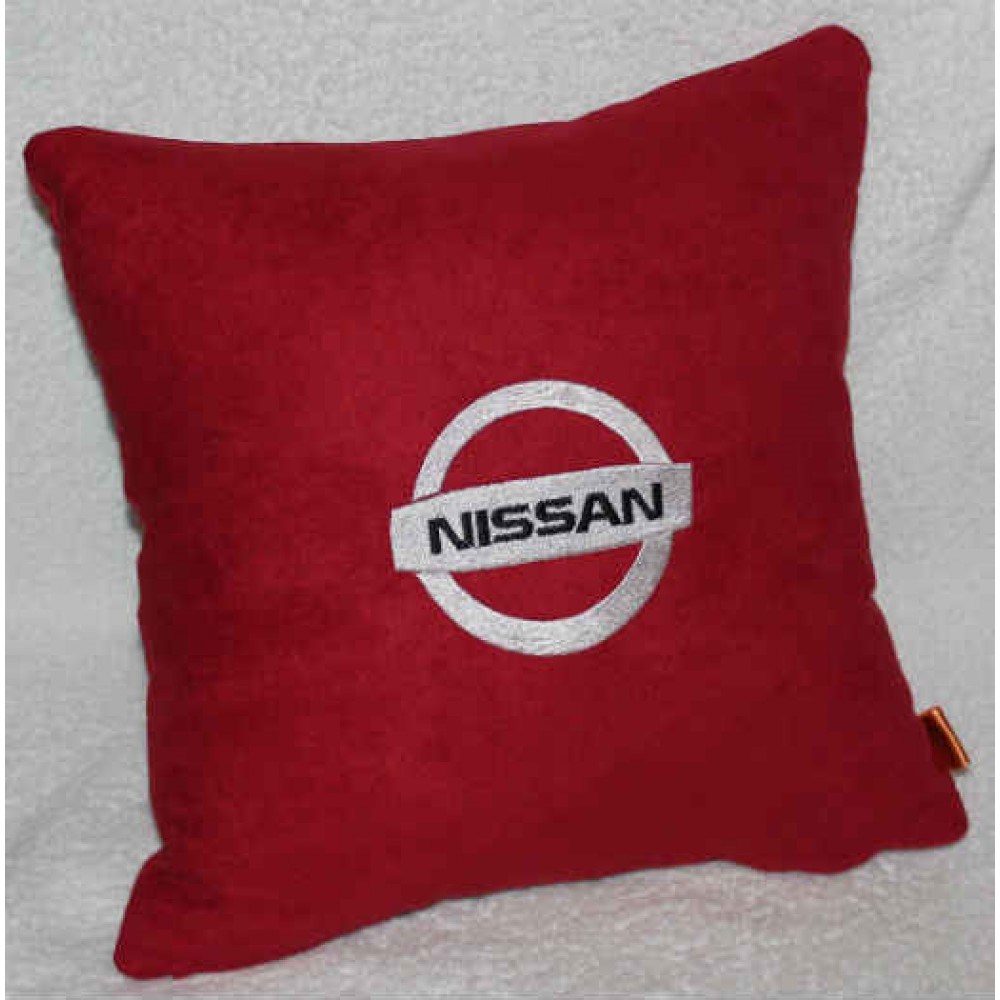 Красная подушка с белой вышивкой Nissan