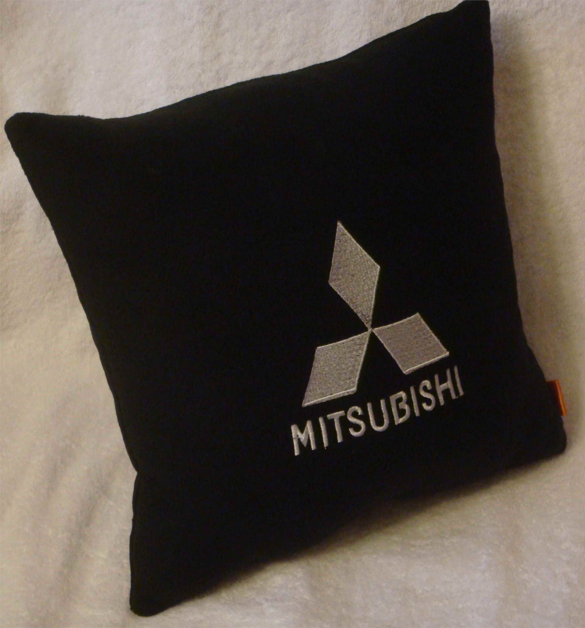Черная подушка с белой вышивкой Mitsubishi