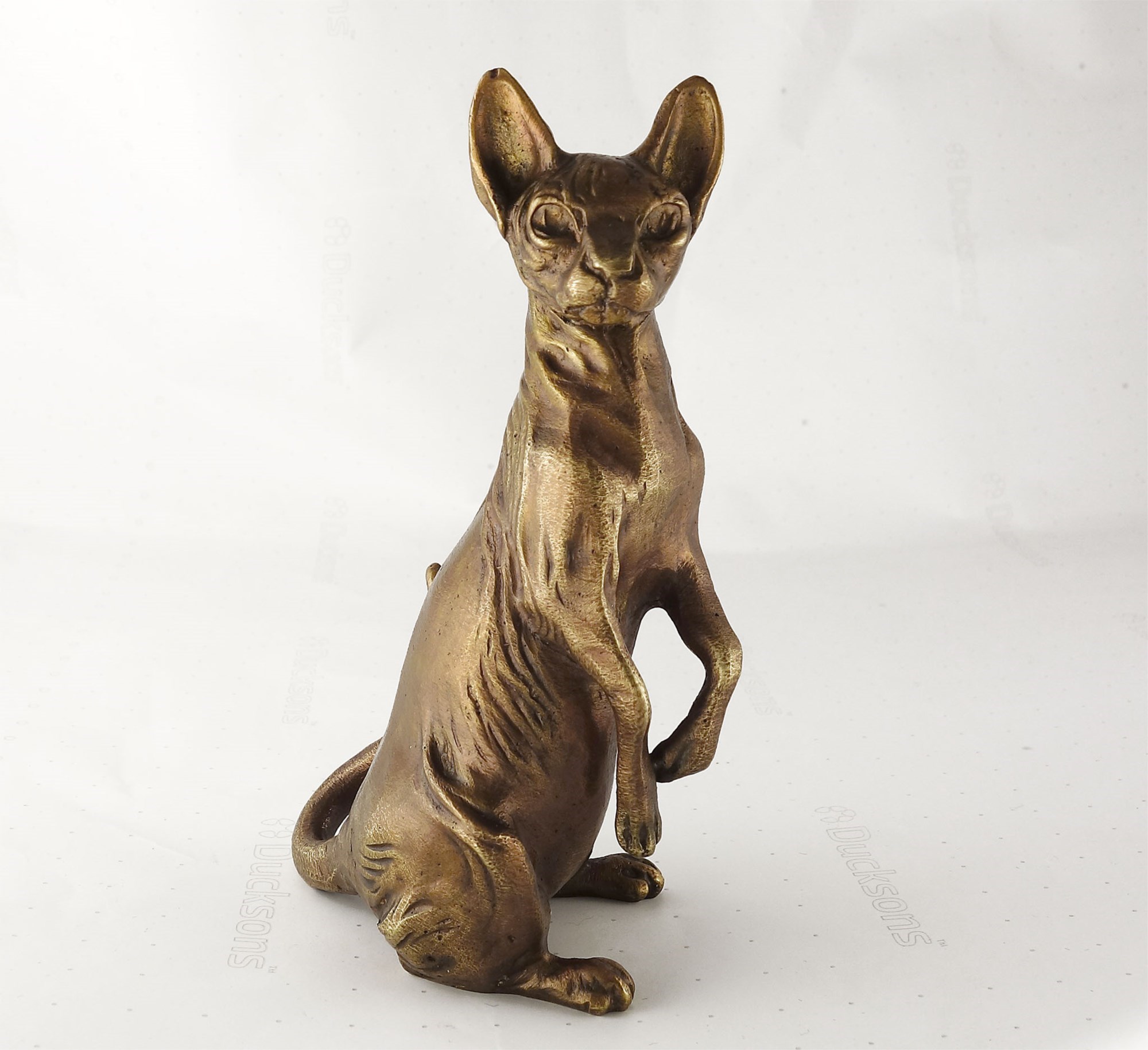 Сфинкс фигурка. Сфинкс фигурка. Статуэтка сфинкс кошка. Сфинкс статуэтка. Статуэтка сфинкс кошка бронзовая.